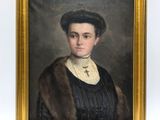 portrait of a woman in a fur coat and black dress