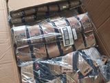 a cardboard box full of wrapping materials in a warehouse