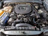 a picture of a car engine with its hood open