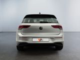 the rear end of a silver volkswagen vw golf