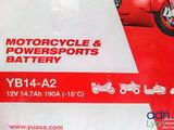 a box with a motorcycle and power sports battery on it