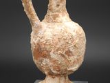 a small vase that is sitting on top of a table