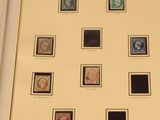a picture of a picture of a collection of stamps on display