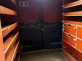 an image of a small room with shelves in it