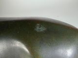 a sculpture of a whale that is sitting on a table