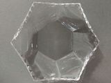a clear glass object that is on a table