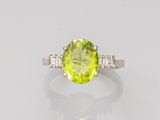 a peridot and diamond ring
