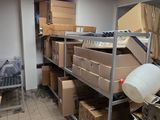 a room filled with boxes and boxes on the floor