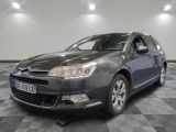 a picture of a grey citrole parked on a checkered floor