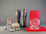 a lot of glass items that are on the table