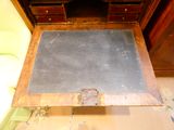 a table with a chalk board on it in a room