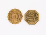 two gold coins, one of which is a 10 cents coin and the other of which is a 10 cents