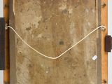 a picture of an old wooden frame with a rope