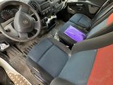 a view of the inside of a van with the driver ' s seat up