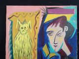 un tableau représentant une femme et un chat accroché au mur