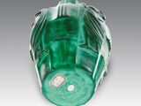 an image of a close up of a green vase on a table