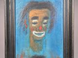 painting of a man with a clown nose in a black frame