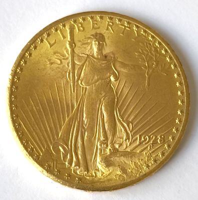 une image d'une pièce d'or sur une surface blanche
