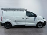 a picture of a white van parked in a room