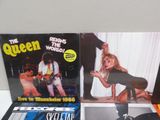 three vinyl albums of the queen and prince of pop and rock music