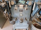 a machine that is sitting on the floor in a room