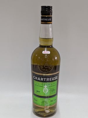 an image of a bottle of whisky sitting on top of a table