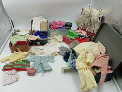a suitcase full of clothes and other items on the floor