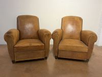 PAIRE de fauteuils Club en cuir.
