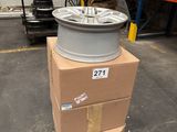 a stack of boxes with a wheel on top of it