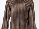 the back of a jacket on a mannequin mannequin mannequin mannequin mannequin mannequin mannequin mannequin mann