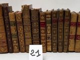 a lot of old books that are sitting on a table