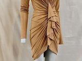 an image of a mannequin dressed in a tan dress