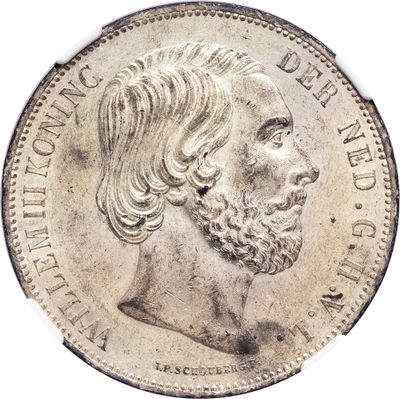 a close up of a coin with a man ' s face on it