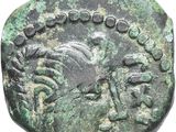 Gros plan sur une pièce de monnaie ornée d'un oiseau