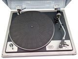a record player that is sitting on top of a turntable