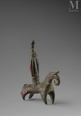 bronze figurine of a horse and rider
