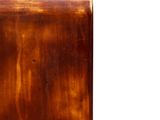 a brown wooden table with a clock on top of it