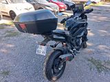 a motorcycle that is parked in a parking lot