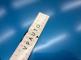 a ruler on a table with a blue background