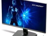 the computer monitor is displaying the image of a woman in a blue dress