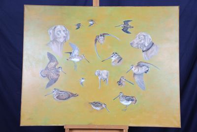 a picture of a painting of birds on a easel