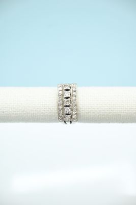 a close up of a ring on top of a napkin
