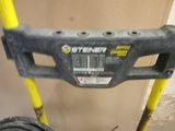 a yellow and black wheel with a yellow handle
