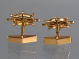 pair of gold plated cufflinks with dragonflies on them