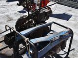 a small machine that is sitting on the ground