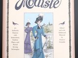 un livre avec la photo d'une femme en robe bleue