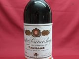 a bottle of wine that is sitting on a table