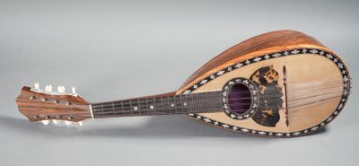 a small guitar that is sitting on a table
