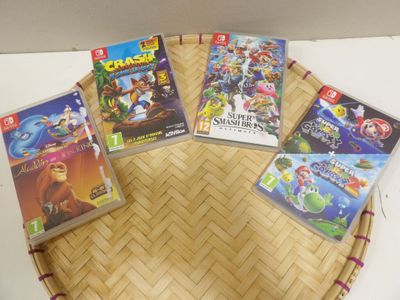 several video games are arranged in a circle on a table