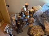 a table with vases and other items on it